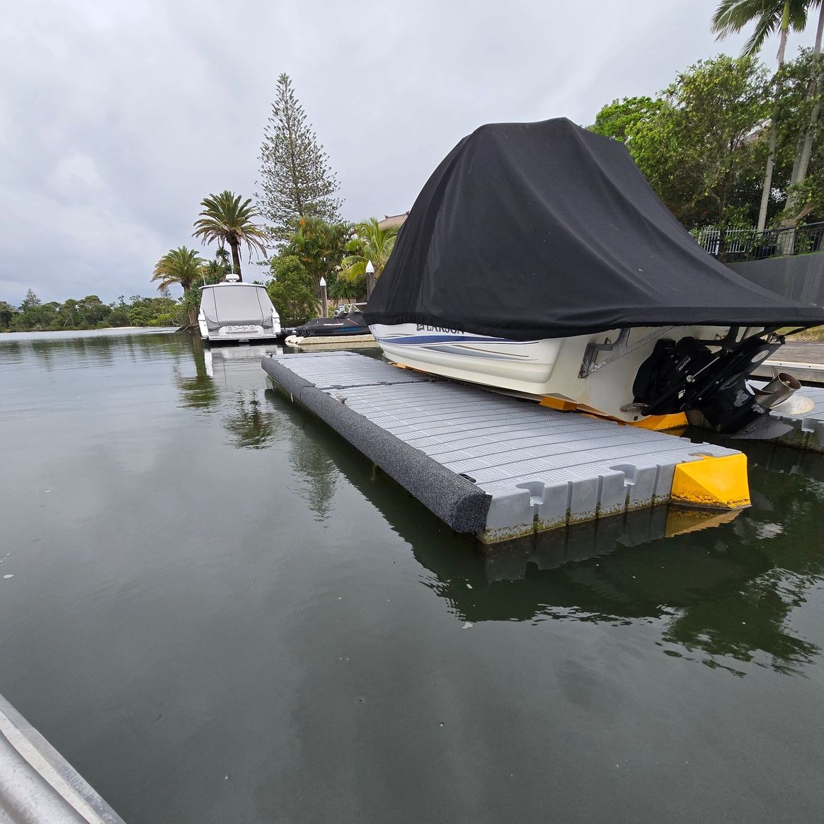 Floating dock with fenders in Gold Coast canal