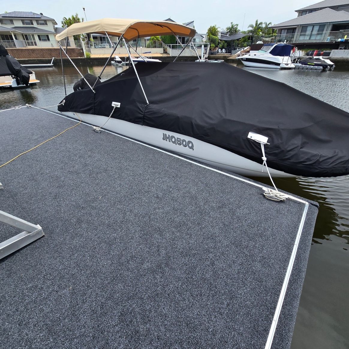 Carpeted pontoon fender on Gold Coast dock with moored boat